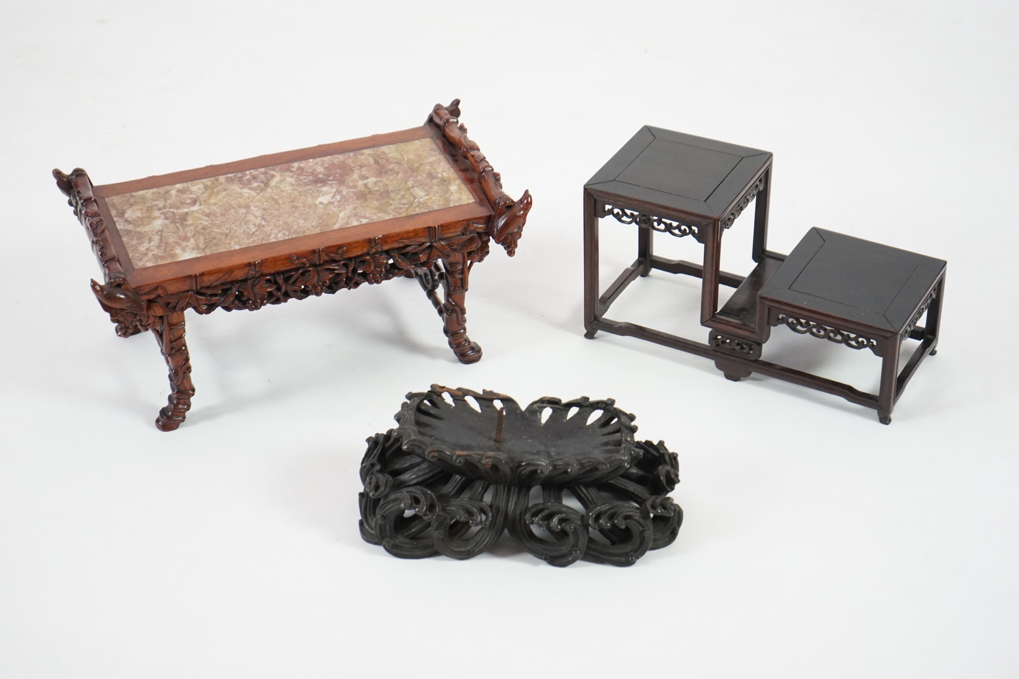 Three Chinese carved wood stands, 19th/early 20th century